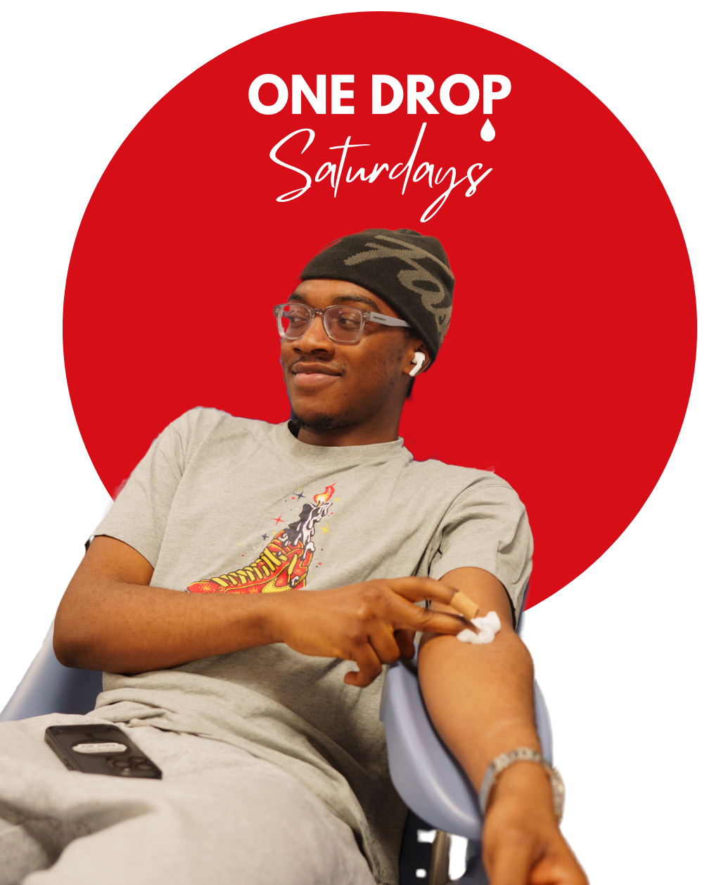 A man sitting in a blood donor chair